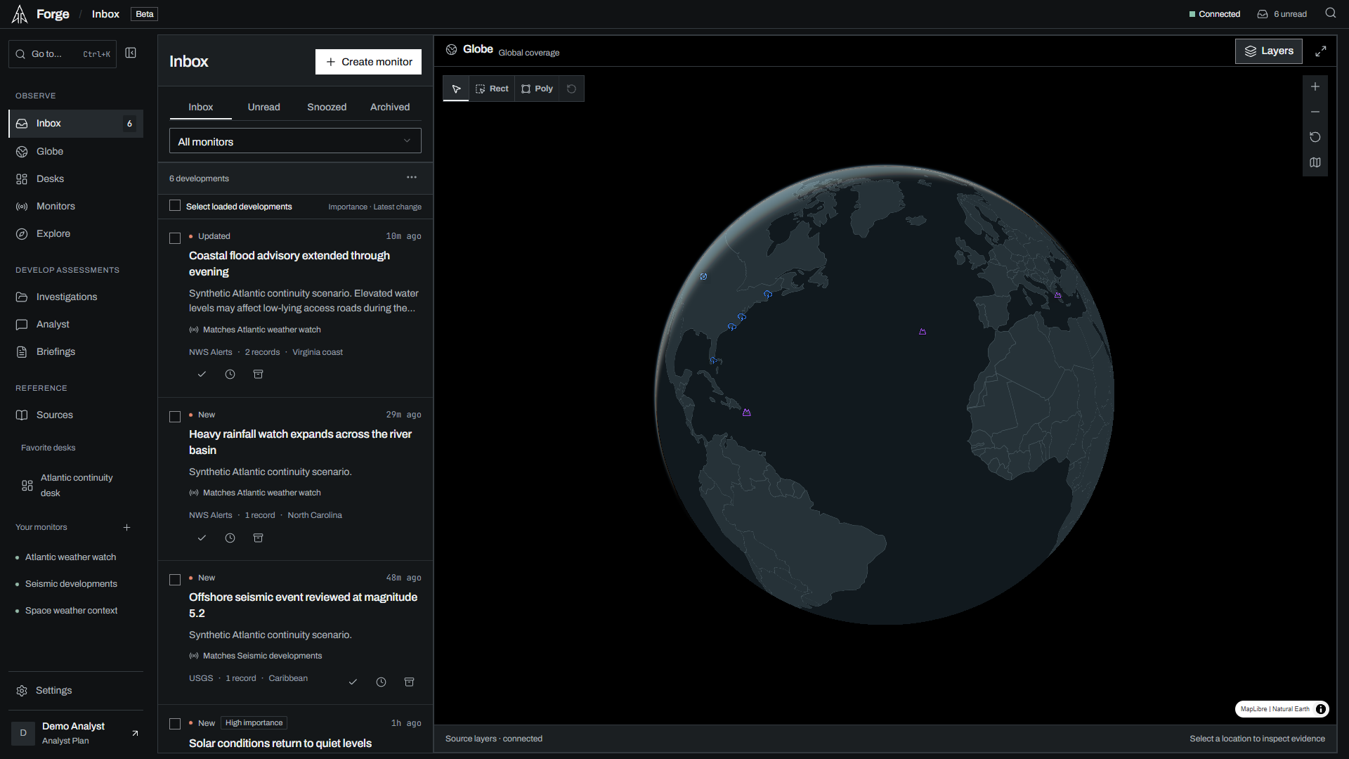 Forge Inbox with six developments and a globe in a synthetic coastal scenario.